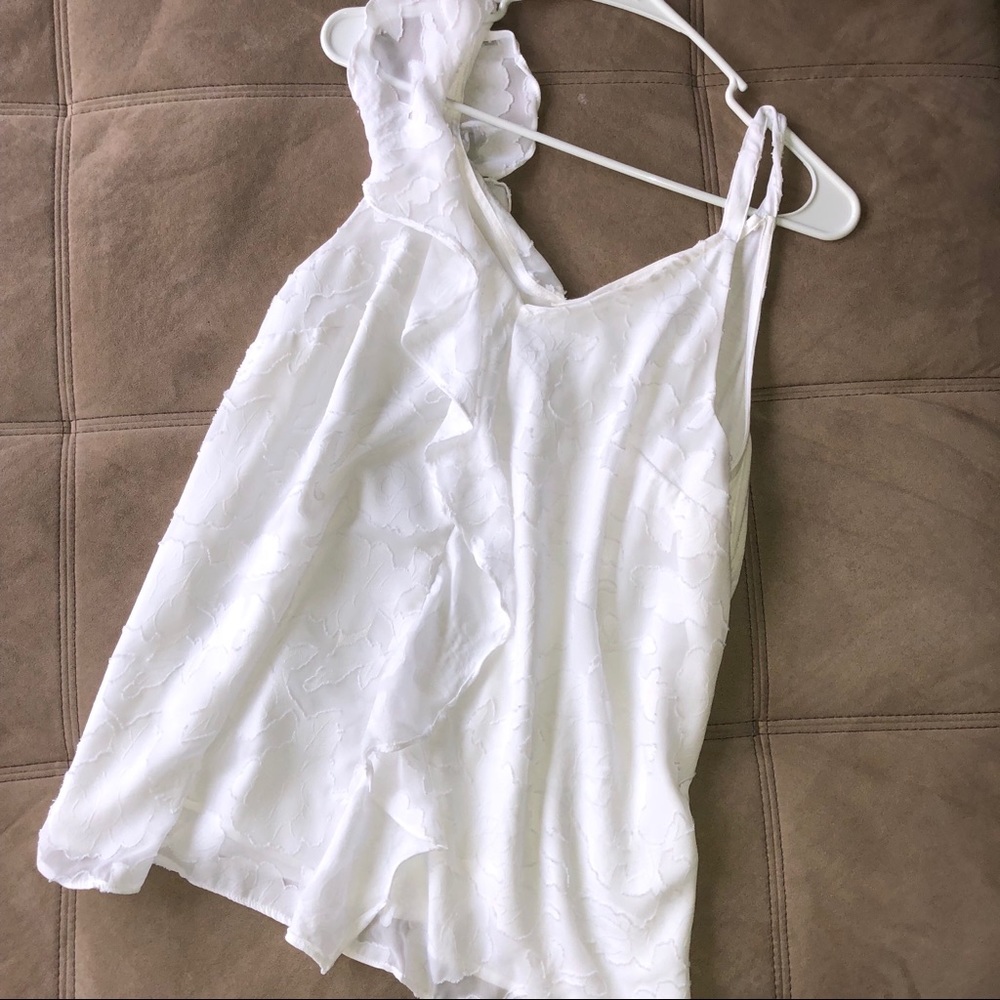 Asymmetrical white tank